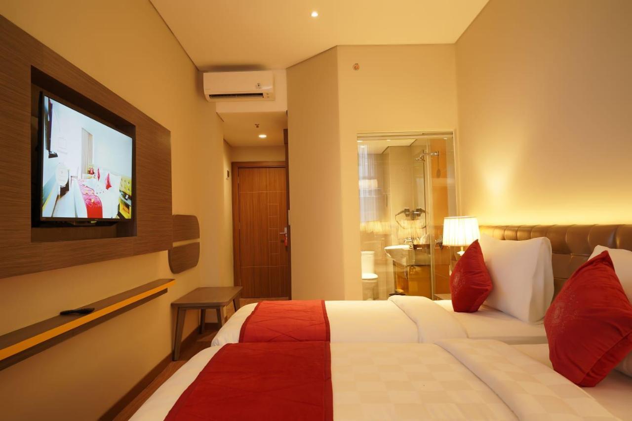 Отель Ramada By Wyndham Yogyakarta Слеман Экстерьер фото
