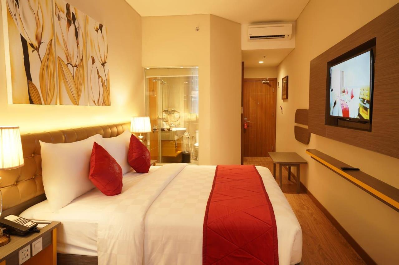 Отель Ramada By Wyndham Yogyakarta Слеман Экстерьер фото